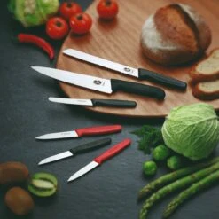 Victorinox Fibrox 21cm Bread Knife Serrated Edge (5253321) 7 Victorinox Fibrox 21cm Bread Knife Serrated Edge (5253321) -KITCHEN KNIVES Shop cut 5 2003 22 b1 1 bread ls2