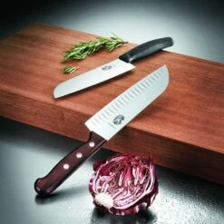 Victorinox Swiss Classic 17cm Santoku Knife Fluted Blade Black (6852317B) 12 Victorinox Swiss Classic 17cm Santoku Knife Fluted Blade Black (6852317B) -KITCHEN KNIVES Shop cut 6 8520 17 b1 santoku 2 1
