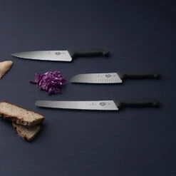 Victorinox Fibrox 25cm Chefs Knife Serrated Edge (5203325) -KITCHEN KNIVES Shop cut fibrox b2 chef ls1 1 8