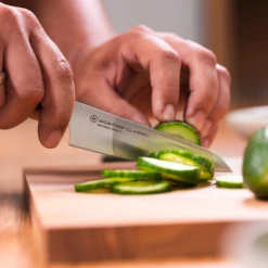 Wusthof Classic Asian 12cm Utility Knife (WT1040136812) -KITCHEN KNIVES Shop wusthof classic asian utility knife lifestyle cutting cucumber borough kitchen 900x